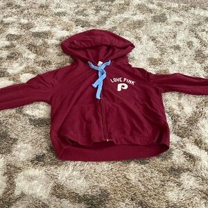 Victorias secret maroon zip up jacket. Size: Womens medium